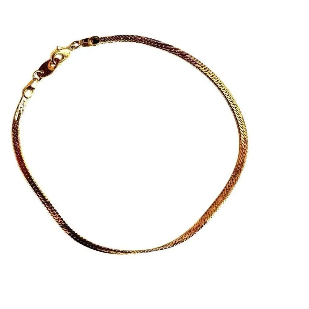 Avon Gold tone herringbone bracelet